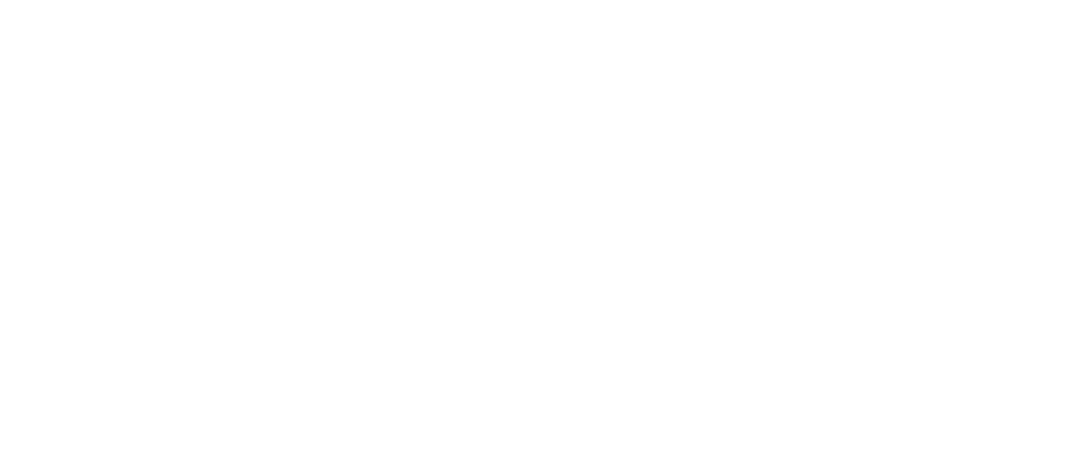 A professional roofing team installing shingles on a residential roof.